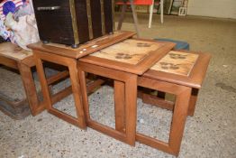 NEST OF THREE TILE TOP TEAK FRAMED OCCASIONAL TABLES BY KEITH EATWELL
