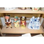 MIXED LOT : CHARACTER JUGS AND A POTTERY FIGURE GROUP