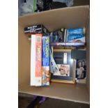 BOX OF MIXED ITEMS TO INCLUDE FRAMED JAMES BOND FILM CELLS, VARIOUS DVDS, BOARD GAMES ETC