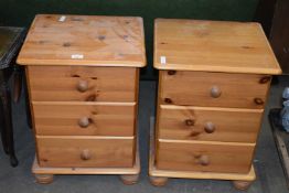 PAIR OF THREE DRAWER PINE BEDSIDE CABINETS