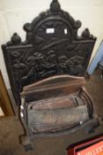 CAST IRON FIRE GRATE TOGETHER WITH ACCOMPANYING DECORATIVE CAST IRON FIRE BACK