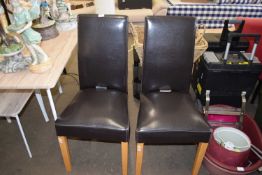 TWO MODERN LEATHER UPHOLSTERED DINING CHAIRS