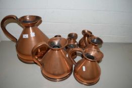 GRADUATED SET OF NINE GEORGE V COPPER HAYSTACK MEASURES FROM 1 GALLON TO ONE EIGHTH GILL