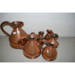 GRADUATED SET OF NINE GEORGE V COPPER HAYSTACK MEASURES FROM 1 GALLON TO ONE EIGHTH GILL