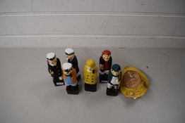 BOSSONS SAILOR WALL PLAQUE TOGETHER WITH SIX PAINTED WOODEN FIGURES (7)