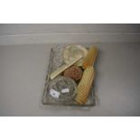 GLASS DRESSING TABLE TRAY CONTAINING VARIOUS DRESSING TABLE BRUSHES, CANDLESTICKS ETC