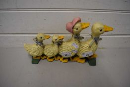 CAST IRON DOORSTOP FORMED AS A FAMILY OF DUCKS
