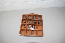 COLLECTION OF SILVER AND OTHER THIMBLES WITH ACCOMPANYING DISPLAY RACK