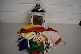 QUANTITY OF COLOURED BUNTING AND A SMALL DISPLAY CASE