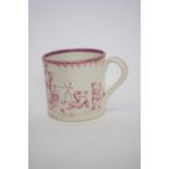 Early 19th century Davenport mug with lustre design of travellers