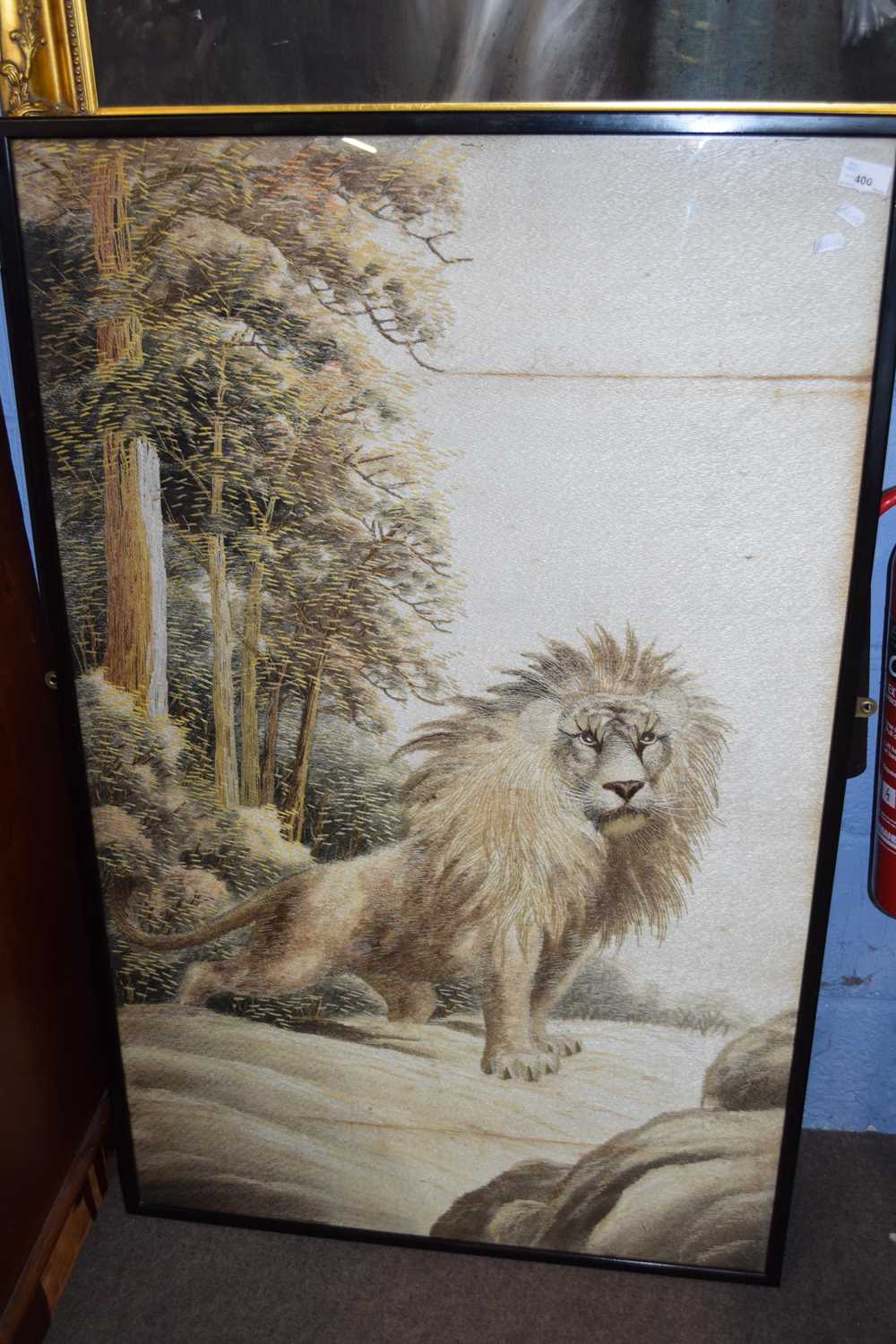 Early 20th century Oriental silk work picture of a lion amongst trees, f/g, 120cm high