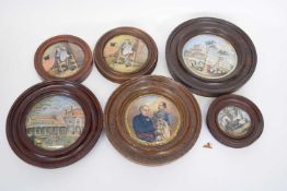 Group of pot lids in wooden frames including one of The Grand International Buildings, one of PM