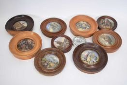 Quantity of pot lids in wooden frames including French street scene, Albert Memorial, 'Hauling in