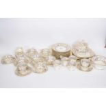 Extensive mid-19th century tea service comprising 12 cups and saucers, further 8 tea cups and