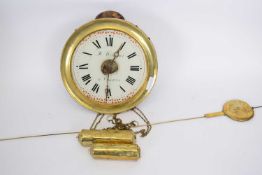 M. Willems A Congres, Continental brass and wooden cased wall clock with circular enamel dial to a