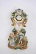 20th century German porcelain cased mantel clock, the case with floral and figural mounts, 40cm