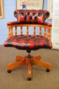 20th century red buttoned leather upholstered bow back revolving office chair, 60cm wide