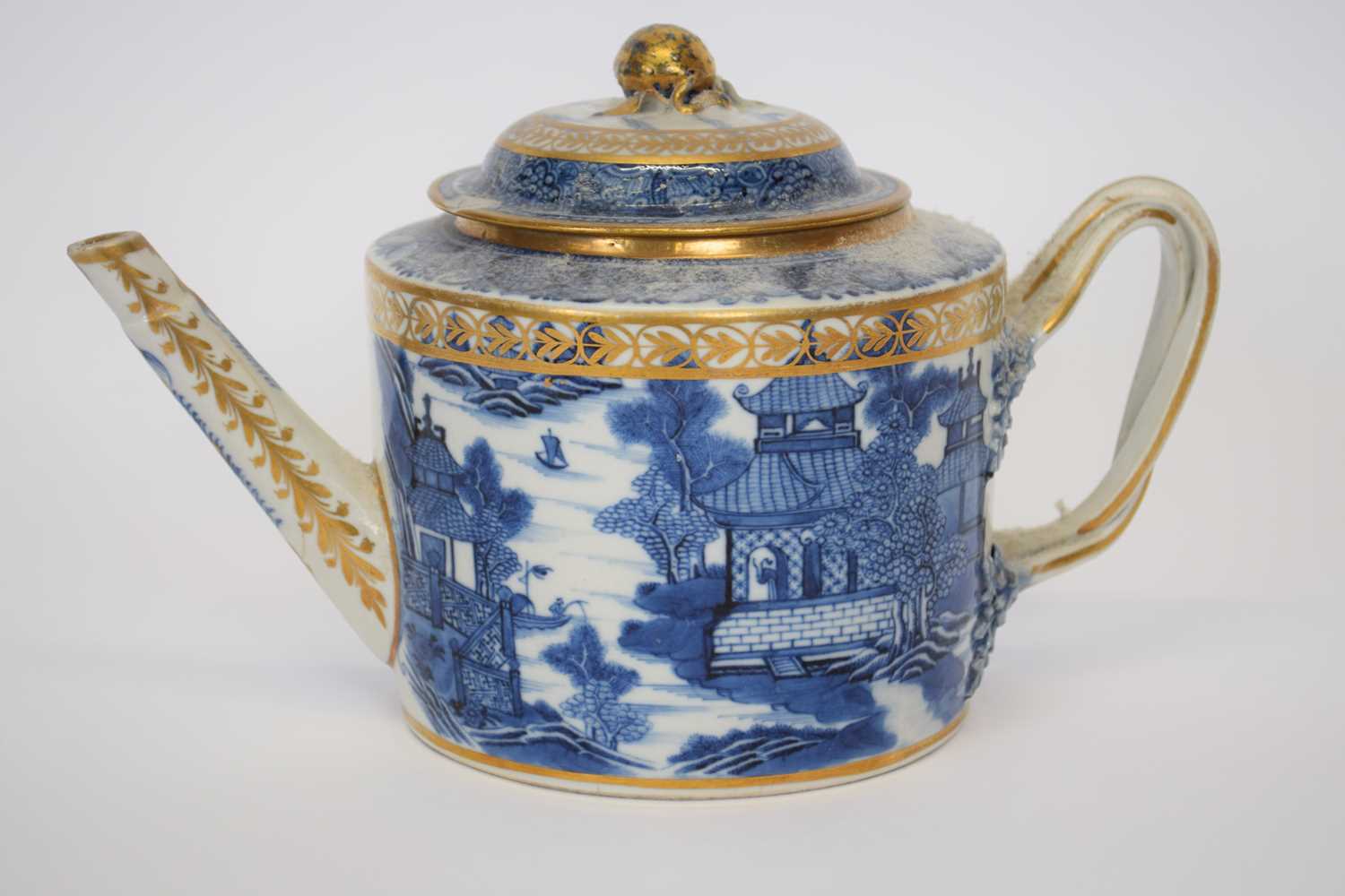 Late 18th century Chinese porcelain teapot with blue and white design and gilt overglaze