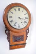 Late 19th century wall clock in walnut veneered case with twin train movement and plain dial with