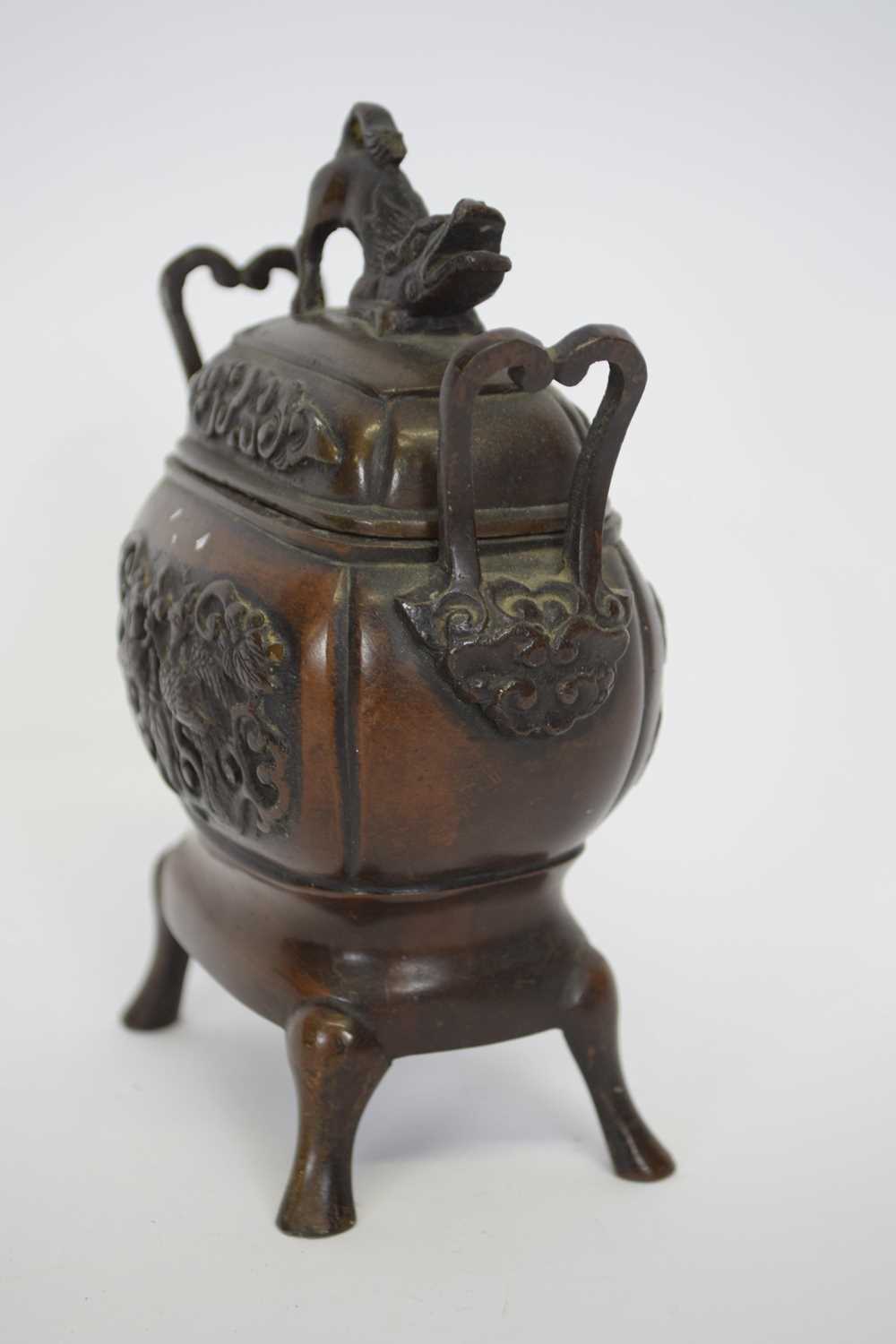 Oriental incense burner and cover raised on four feet, the vase with an impressed design of birds in - Image 3 of 6