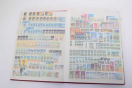 Stock book of US stamps together with further album mainly of the Pacific islands including 140