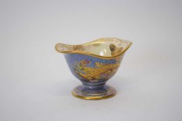 Crown Devon small lustre ware bowl decorated with a dragon with butterflies to the interior