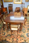 Late Victorian mahogany extending dining table with single leaf together with a set of six Victorian