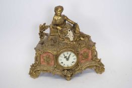 20th century Continental brass cased mantel clock with figural mount, plain enamel dial and a