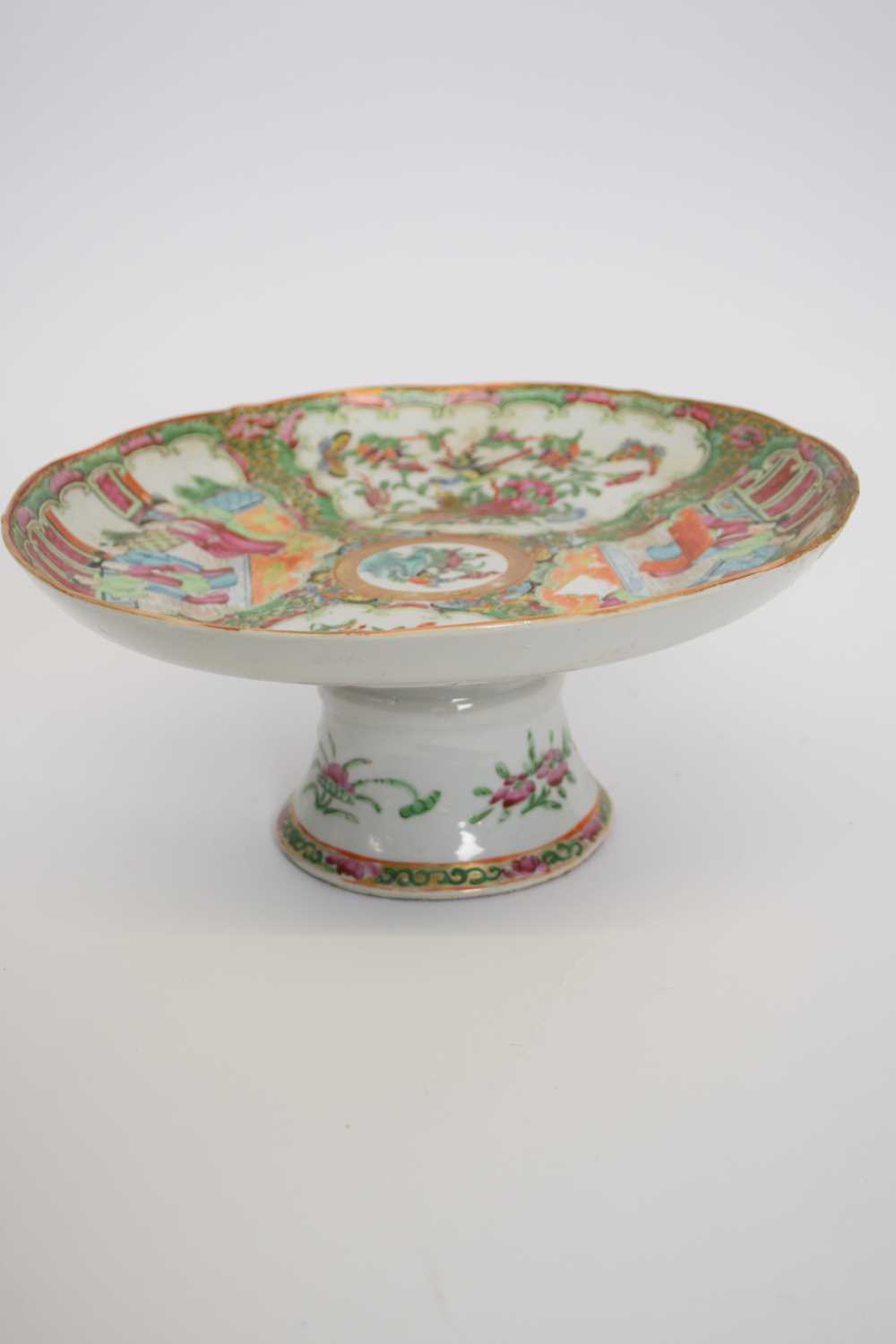 Cantonese porcelain tazza with typical designs of panels, figures, alternating with panels of