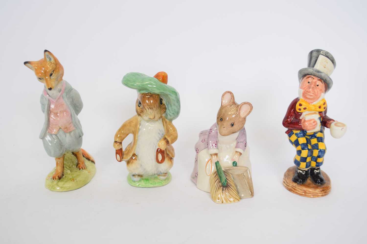 Group of Beswick Beatrix Potter figures including Foxy Whiskered Gentleman, Hunca Munca sweeping,