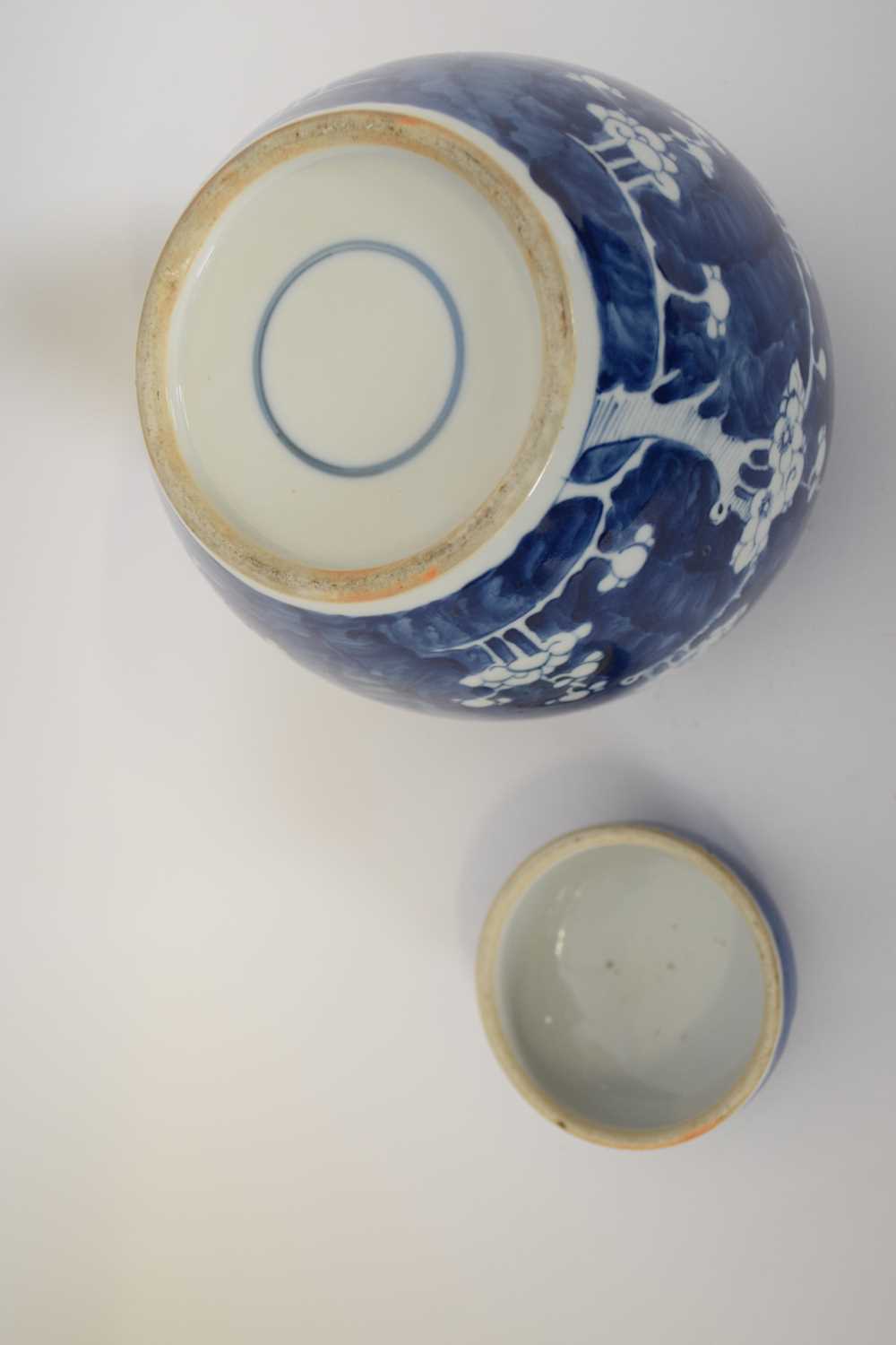 Chinese porcelain jar and cover with prunus decoration on a blue ground - Image 2 of 6