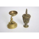 Two brass incense burners, one formed with a dolphin support, largest 15cm high