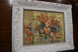 19th century white painted foliate moulded picture frame containing a coloured print of sweet