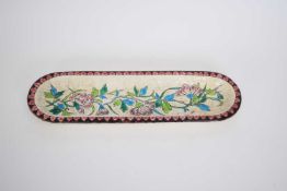 French pottery Longwy dish decorated with flowers, 28cm long