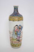 Chinese polychrome vase, Republican period, decorated with Chinese figures amongst clouds, the