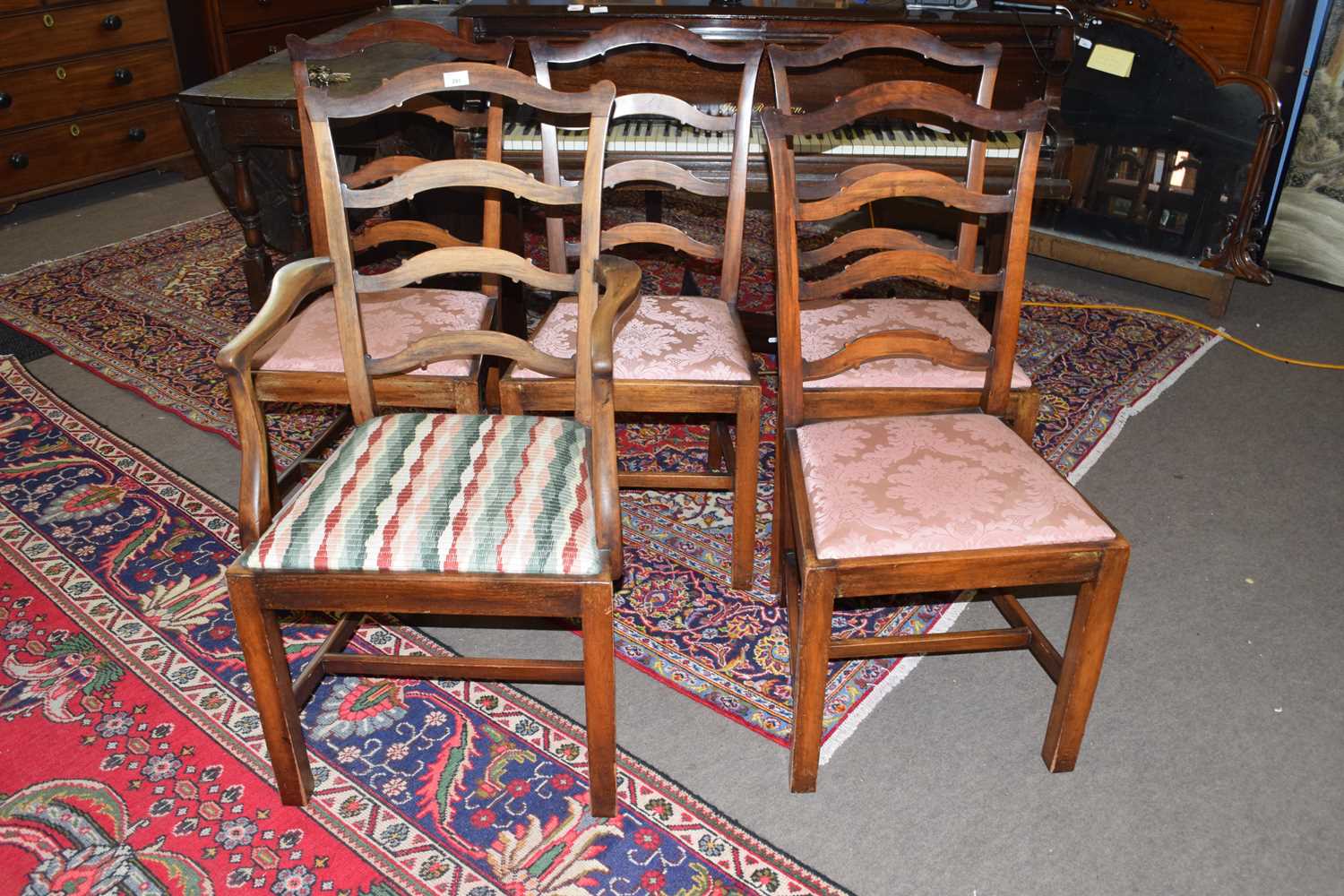 Set of five Georgian style mahogany ladderback dining chairs comprising one carver and four single