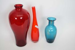 Ruby coloured Art Glass Baluster Vase together with a similar example cylindrical shape and a blue