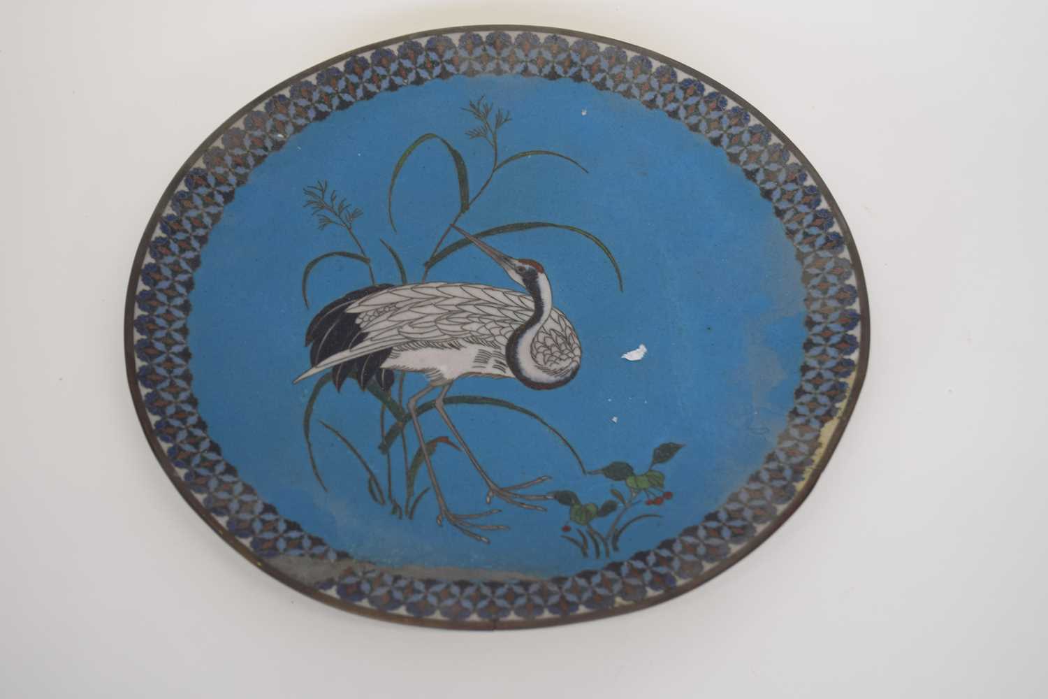 Large Japanese cloisonne dish decorated with a crane, 30cm diam