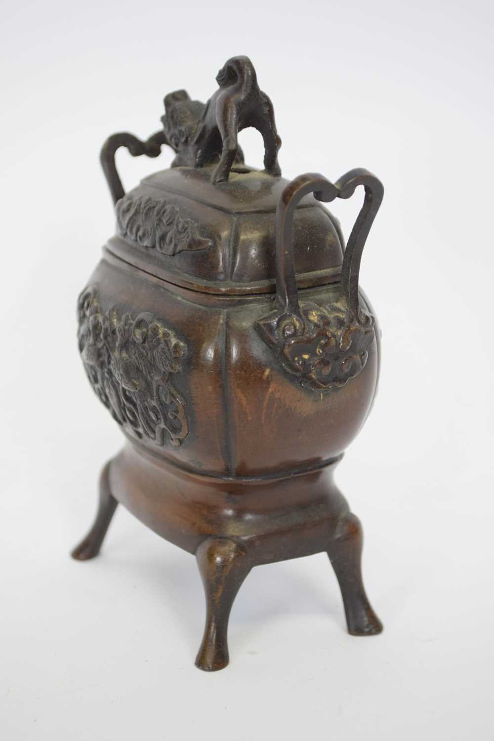 Oriental incense burner and cover raised on four feet, the vase with an impressed design of birds in - Image 5 of 6