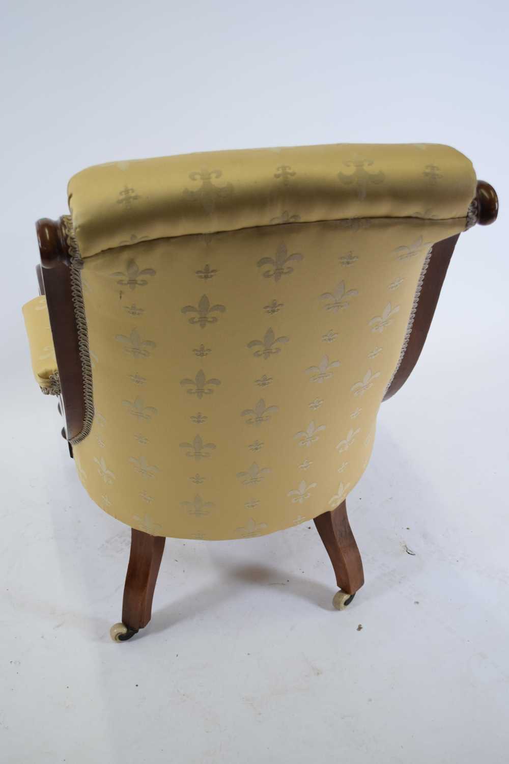 Victorian mahogany framed scroll arm chair upholstered in yellow buttoned fabric, raised on turned - Image 3 of 3