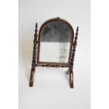 19th century miniature cheval mirror set on a turned frame, 28cm high