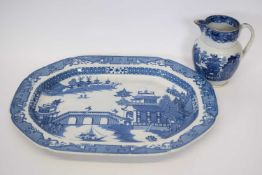 Large pearlware blue and white platter together with a pearlware jug, the platter 50cm long (2)