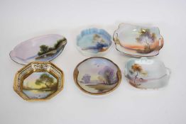 Quantity of Noritake dishes, unusual colour, landscapes on a pale blue ground (6)