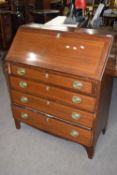 Georgian mahogany bureau with fall front opening to a pigeonholed interior over a four drawer