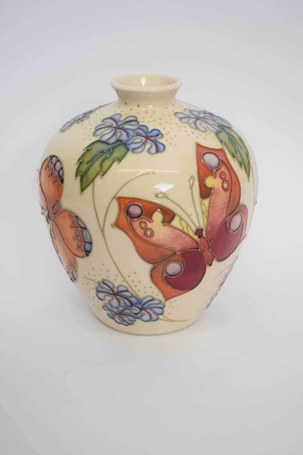 Moorcroft vase with tube lined design of butterflies on a pale beige ground - Image 4 of 6