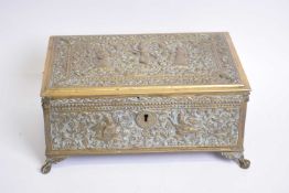 Unusual Indian pressed brass casket with hinged lid, decorated with various figures and foliage,