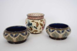 Two Doulton Lambeth salts with geometric design, together with a Zsolnay small lustre vase (3)