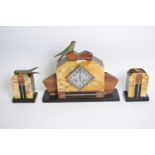 Art Deco period coloured marble 3-piece clock garniture, the architectural cased clock with twin