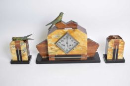 Art Deco period coloured marble 3-piece clock garniture, the architectural cased clock with twin