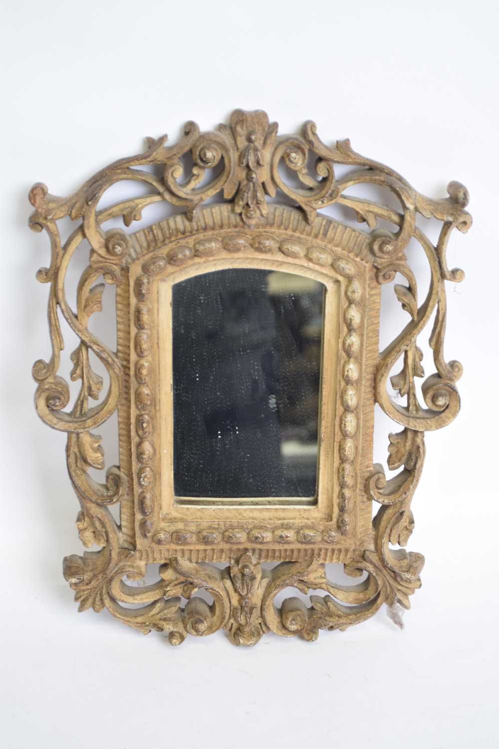 Small 19th century wall mirror in pierced Florentine style carved wooden frame, 32cm high